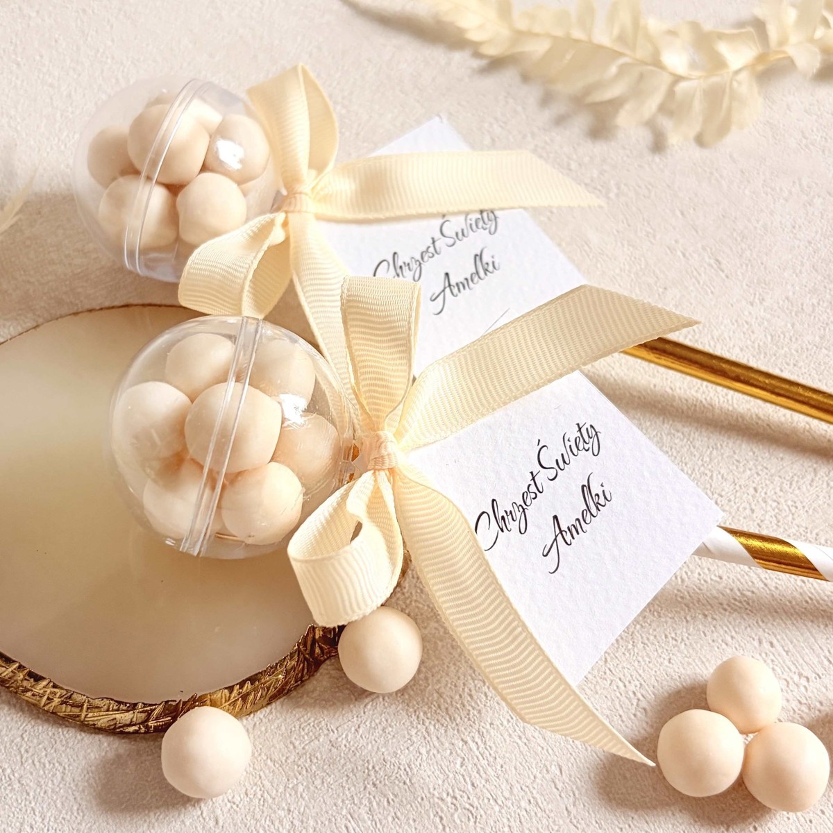 Podziękowania dla gości na Chrzest - Grzechotka złota z kokosowymi drażetkami